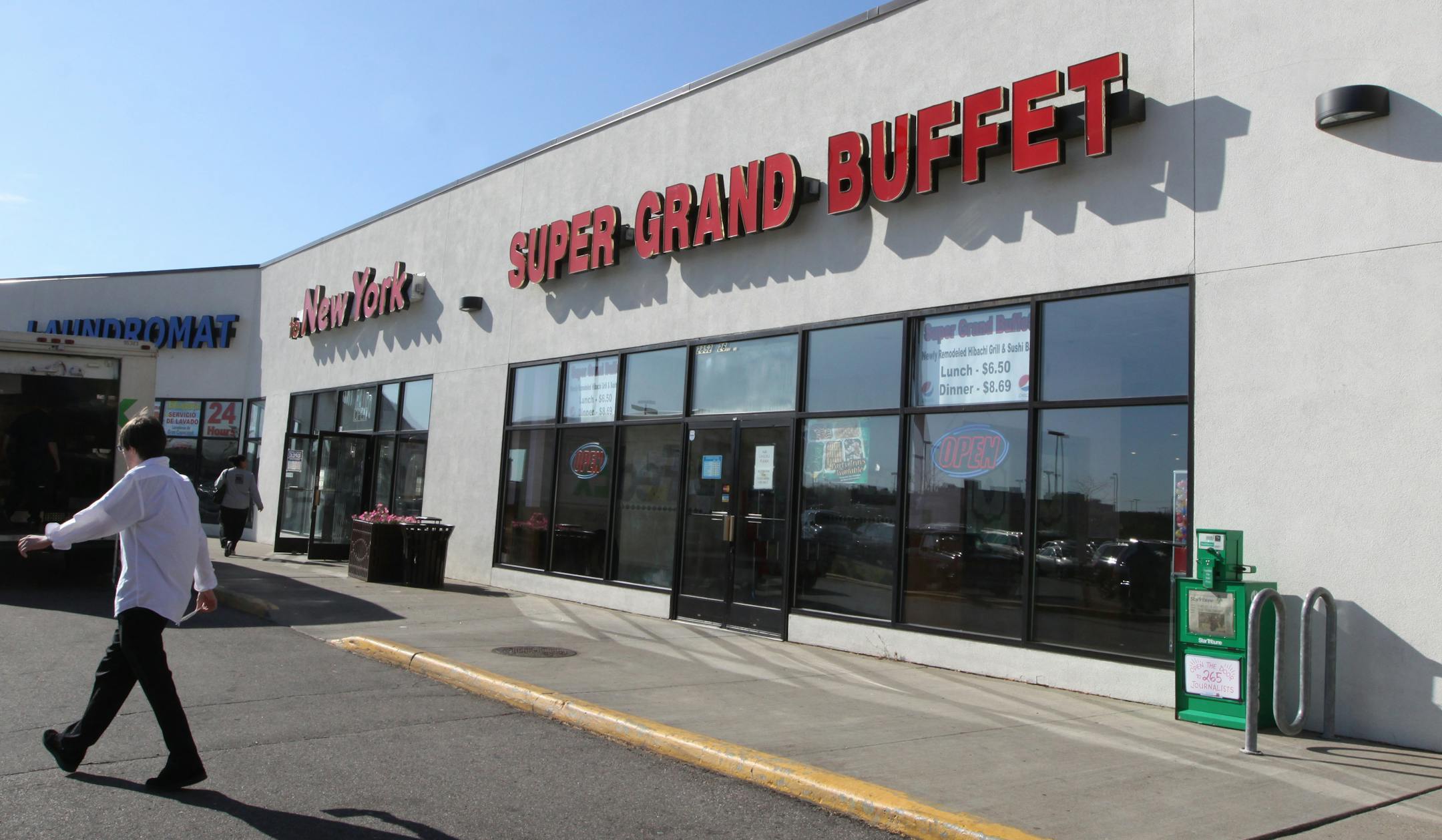 The only evidence of a fatal shooting was piles of police line tape put in the garbage bins behind the Super Grand Buffet at 2852 26th Ave. S., in Minneapolis, on Oct. 21, 2011.