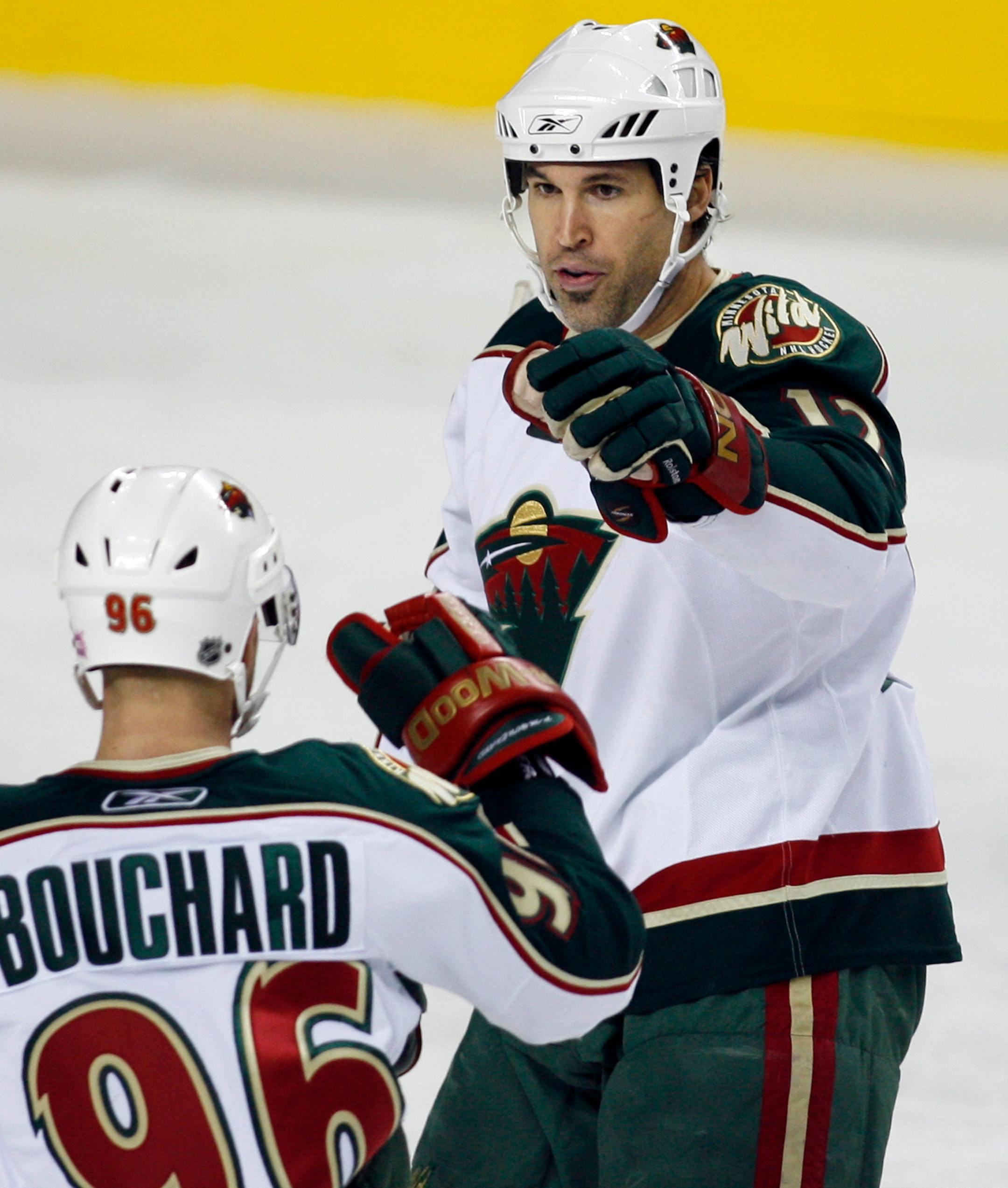 Minnesota Wild's Brian Rolston, right, is trying to negotiate a new contract to stay in Minnesota.