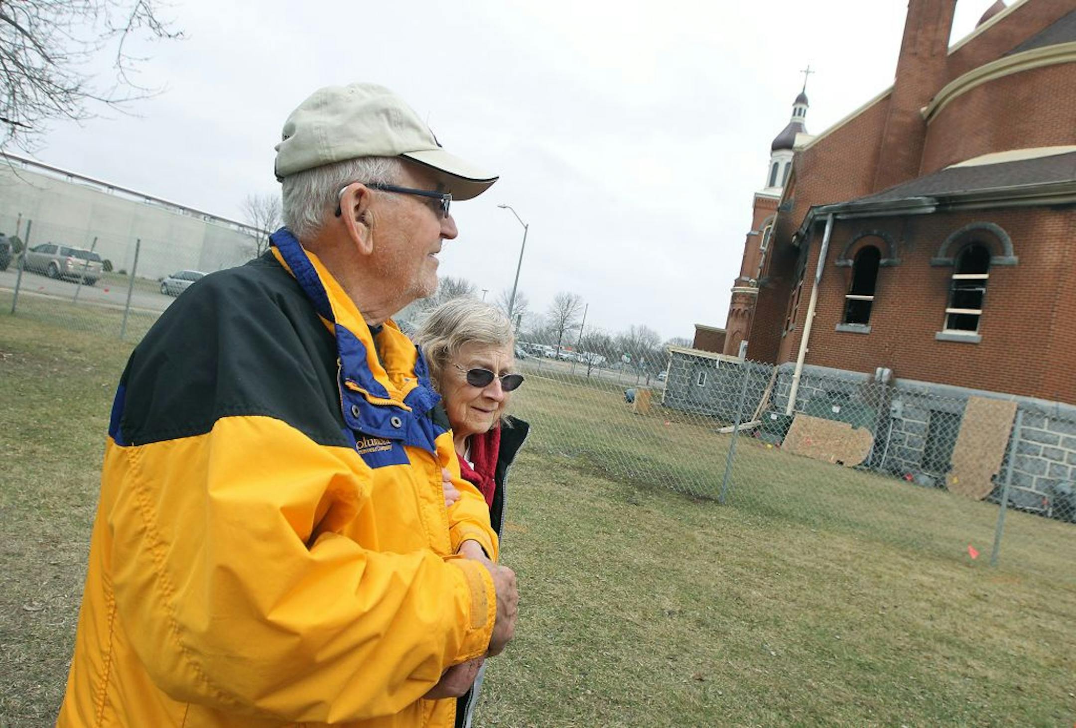 Dick and Gwen Indieke, went to visit the church he once attended as local fire and federal agents arrived to inspect the scene where a fire damaged about 30 percent of the 120-year-old St. Mary's Catholic Church, Monday, March 14, 2016 in Melrose, MN.