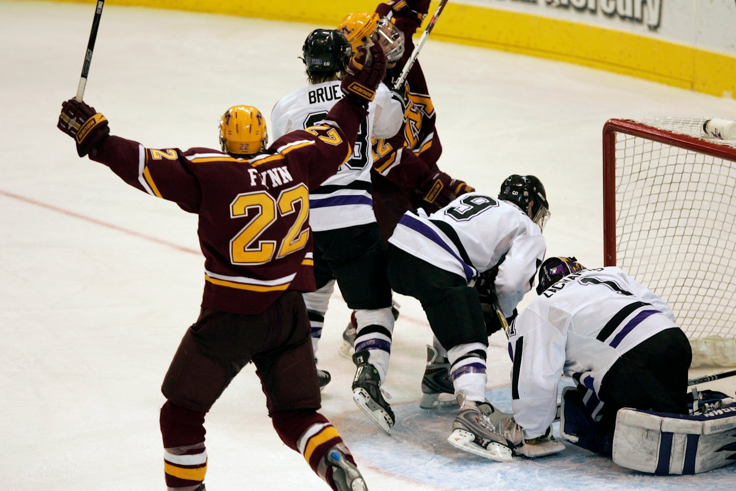 Ryan Flynn celebrates the game-winning goal by Tony Lucia.