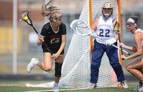 Lakeville South's Emily Moes (23) looked for a shot during the first half. Moes scored twice as South took a 5-0 lead and held a 6-4 halftime lead. St