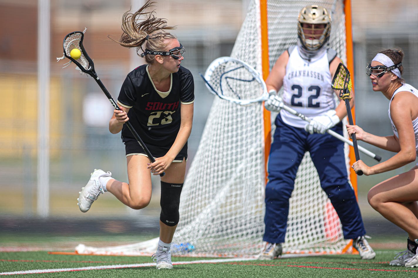 Lakeville South's Emily Moes (23) looked for a shot during the first half. Moes scored twice as South took a 5-0 lead and held a 6-4 halftime lead. State girls' lacrosse championship, Lakeville South vs. Chanhassen, 6-18-22. Photo by Mark Hvidsten, SportsEngine