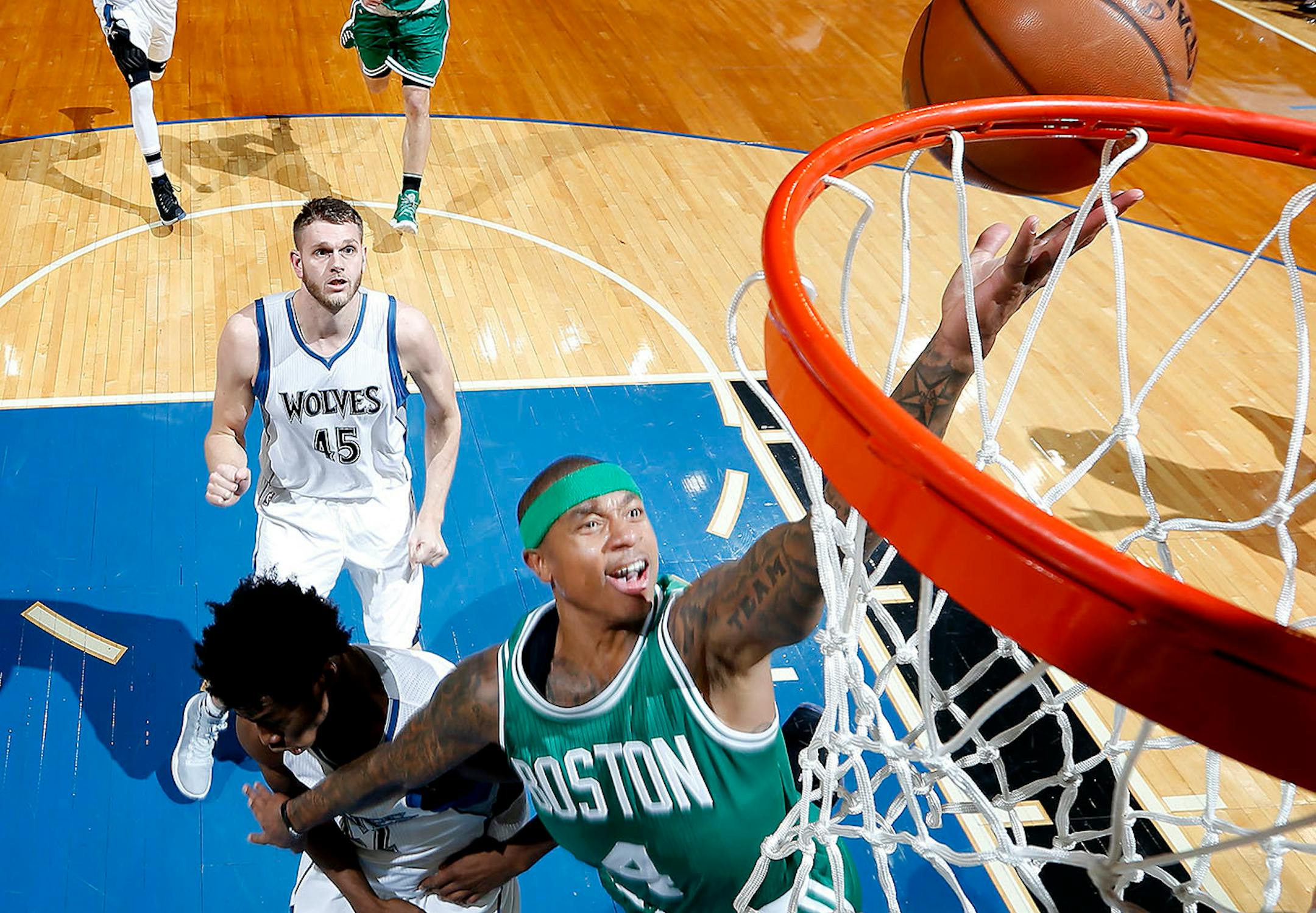 Isaiah Thomas (4) attempted a shot while being defended by Andrew Wiggins (22) in the second half. ] CARLOS GONZALEZ cgonzalez@startribune.com - November 21, 2016, Minneapolis, MN, Target Center, NBA, Minnesota Timberwolves vs. Boston Celtics