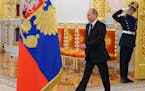 Russian President Vladimir Putin,, enters the Alexadrovsky Hall to head a meeting of the Presidential Council for Civil Society and Human Rights at th