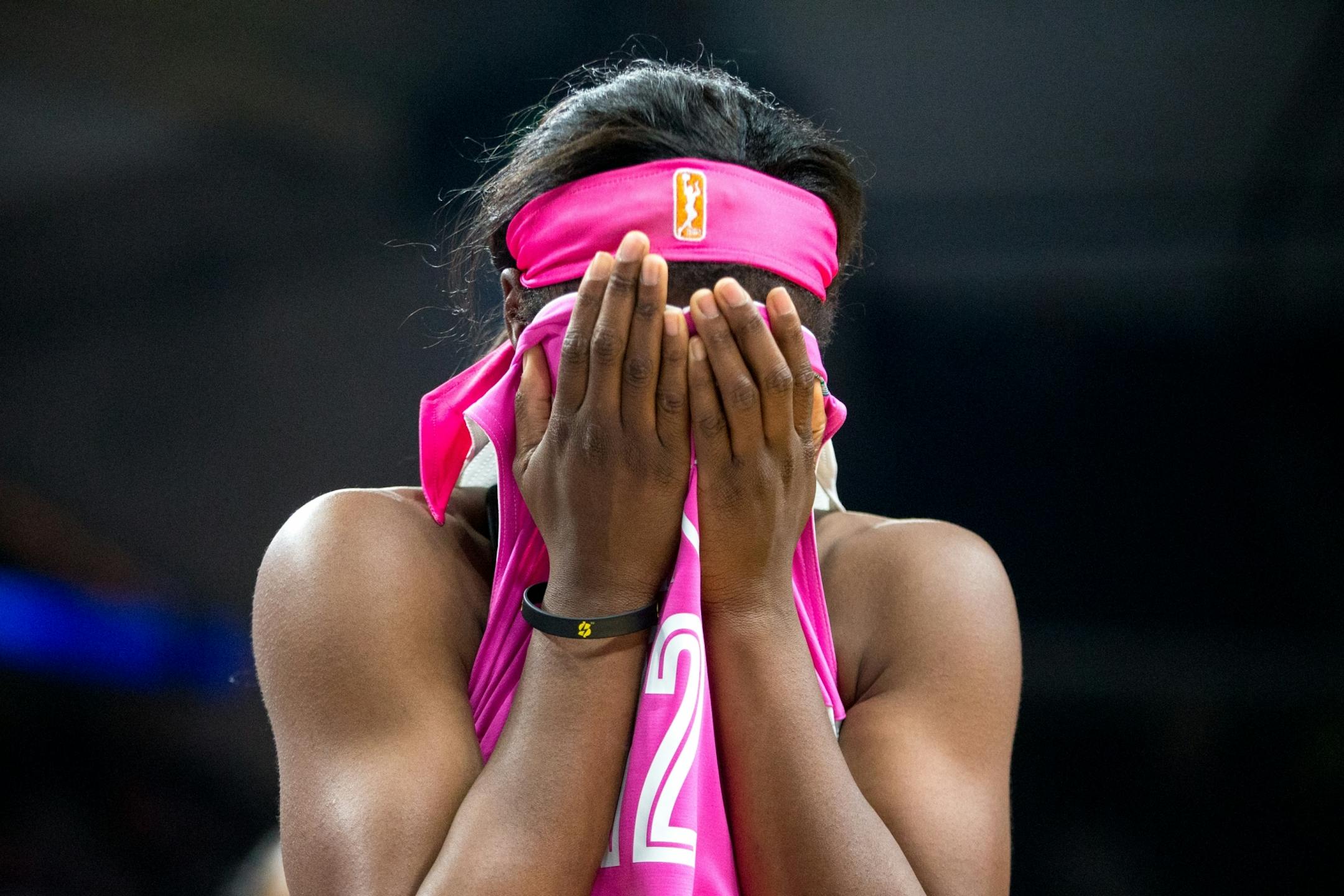 Minnesota Lynx guard Alexis Jones (12) covers her face after being fouled during the second half against the Indiana Fever on Friday, Aug. 18, 2017, at Xcel Energy Center.