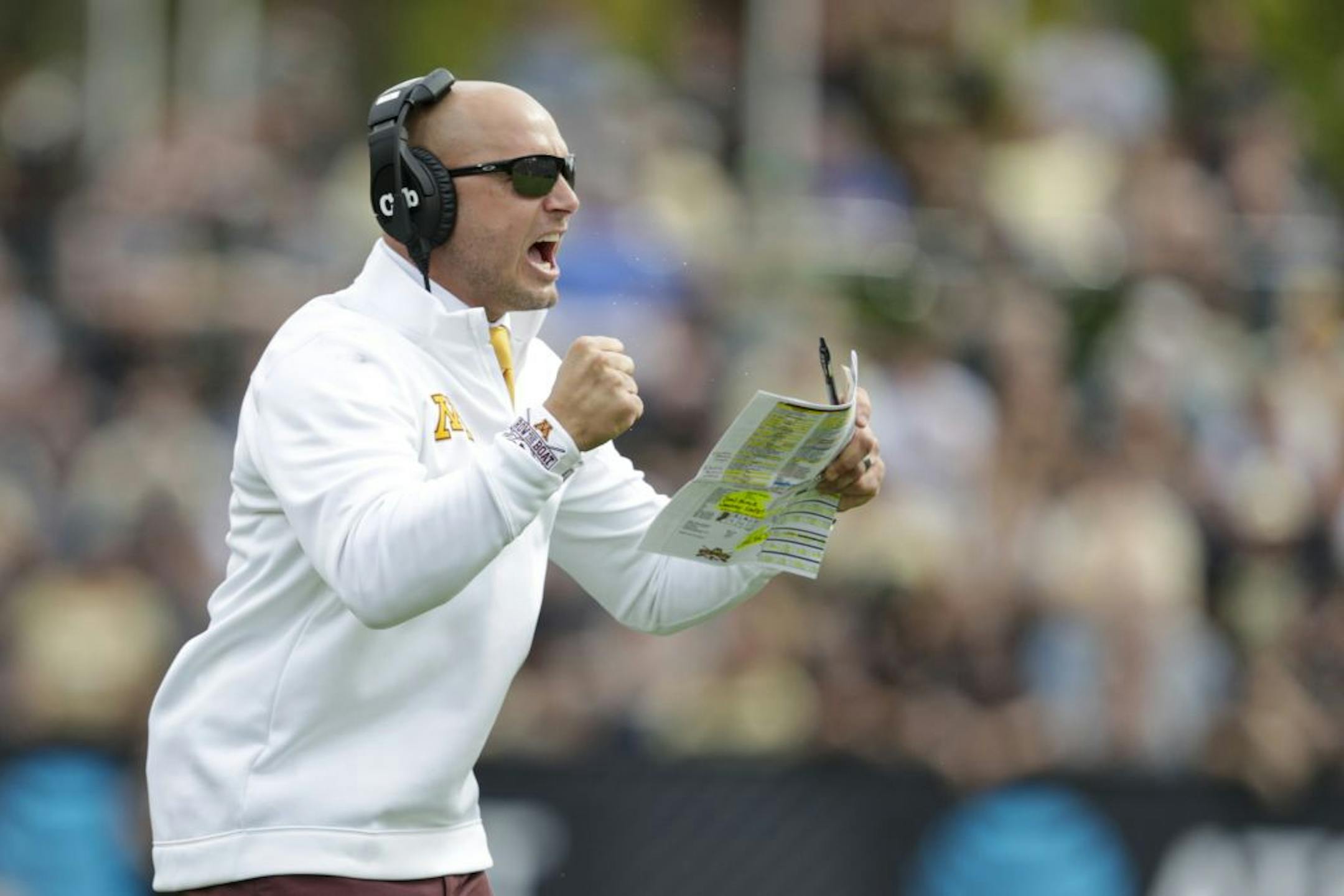 Minnesota head coach P.J. Fleck celebrates a touchdown during the first half of an NCAA college football game against Purdue in West Lafayette, Ind., Saturday, Sept. 28, 2019.