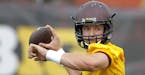 Minnesota quarterback Mitch Leidner drops back for a pass during NCAA college football training camp in Minneapolis Friday, Aug. 7, 2015. (AP Photo/An