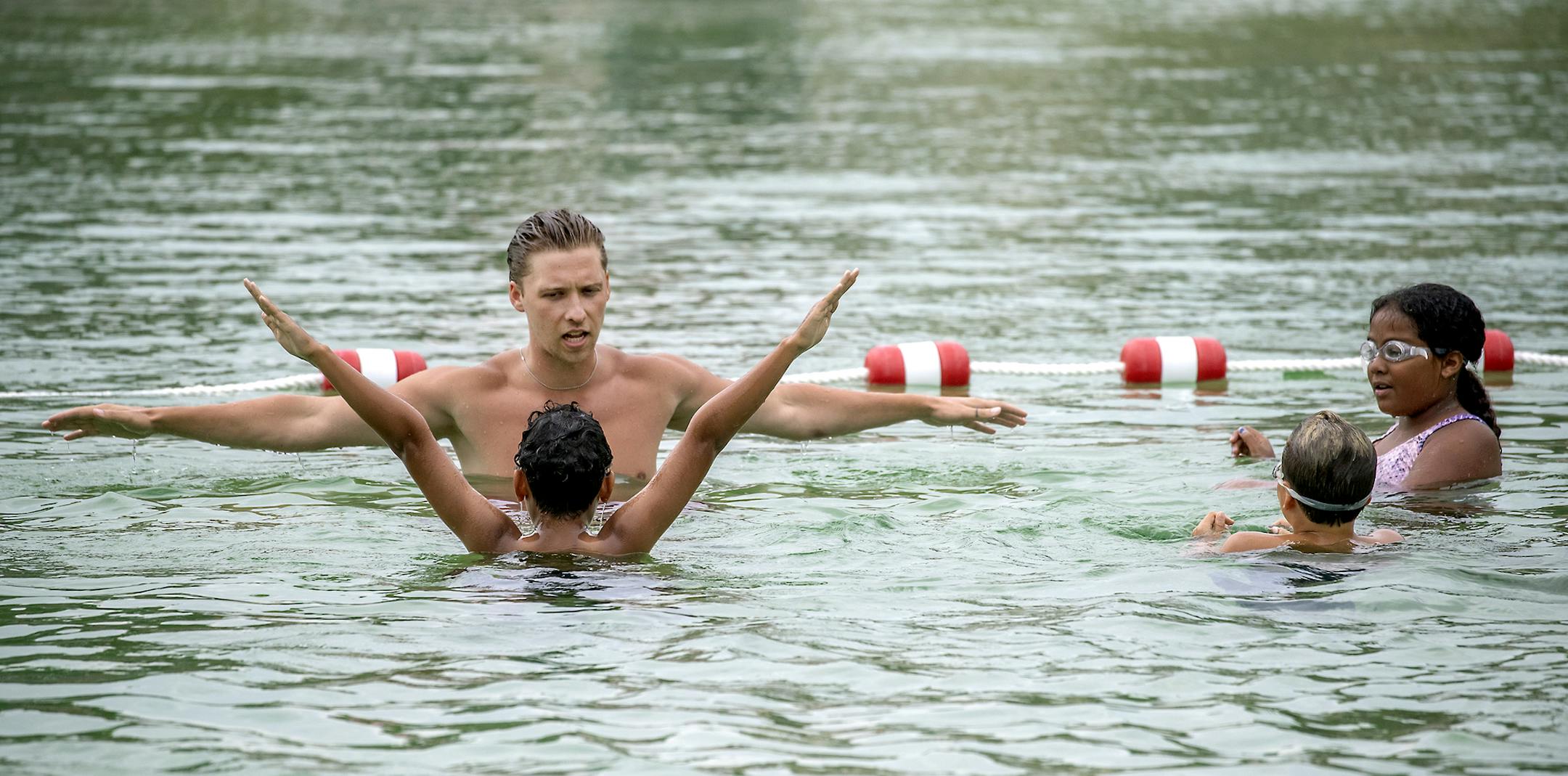 Webber Pool lifeguard Lee Hightman-Nocon, cq, gave swimming lessons to children at the pool, Tuesday, July 9, 2019 in Minneapolis, MN. The Hennepin County Sheriff's Office (HCSO) has partnered with the Minneapolis Parks and Recreation Board to offer low-cost swimming lessons to those who need to learn to swim but cannot afford lessons. ] ELIZABETH FLORES • liz.flores@startribune.com