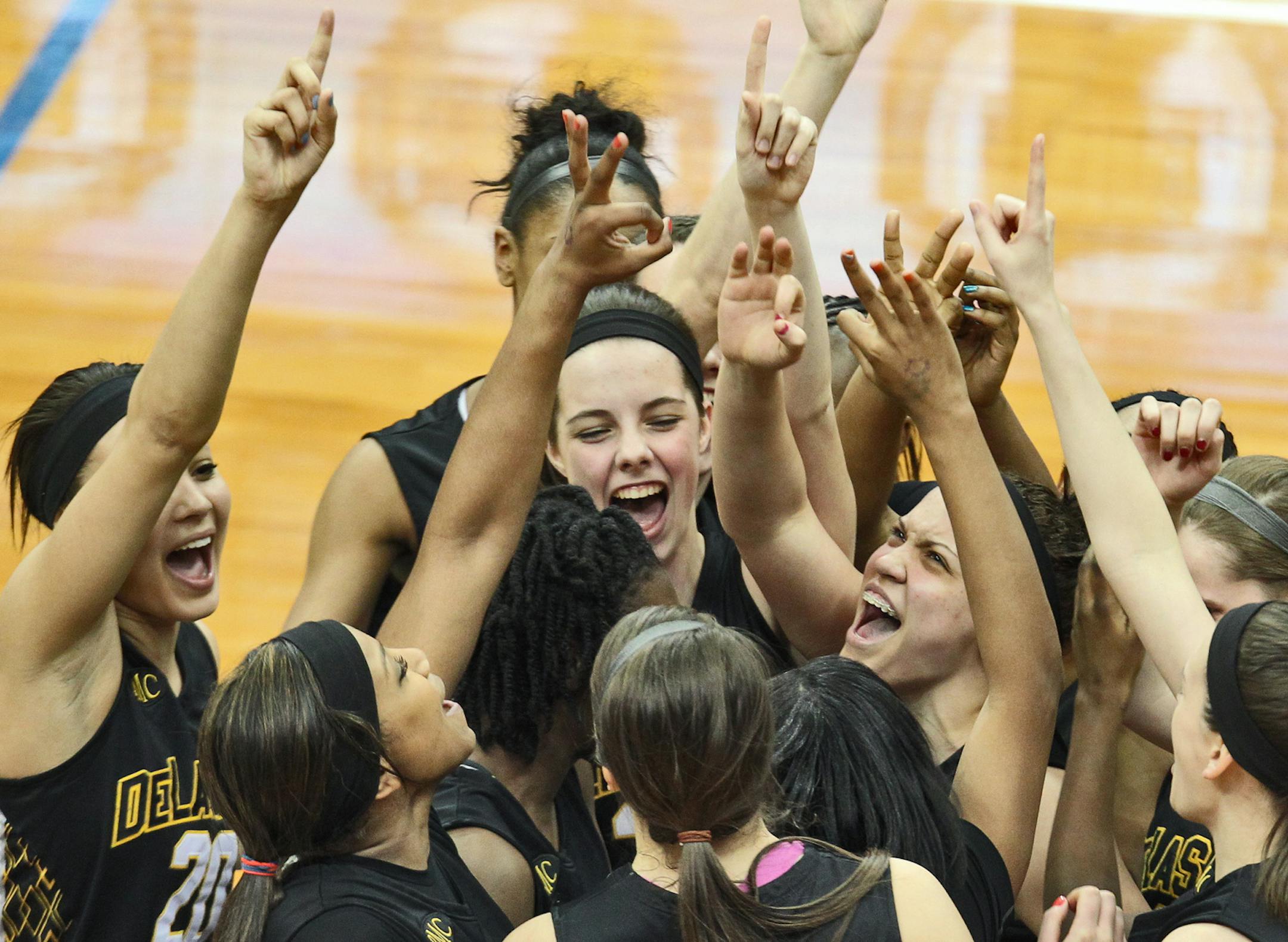 Class 3A Girls Basketball Championship Game. Red Wing vs. DeLaSalle. DeLaSalle players celebrated at the final horn of their championship victory. (MARLIN LEVISON/STARTRIBUNE(mlevison@startribune.com (cq -program)