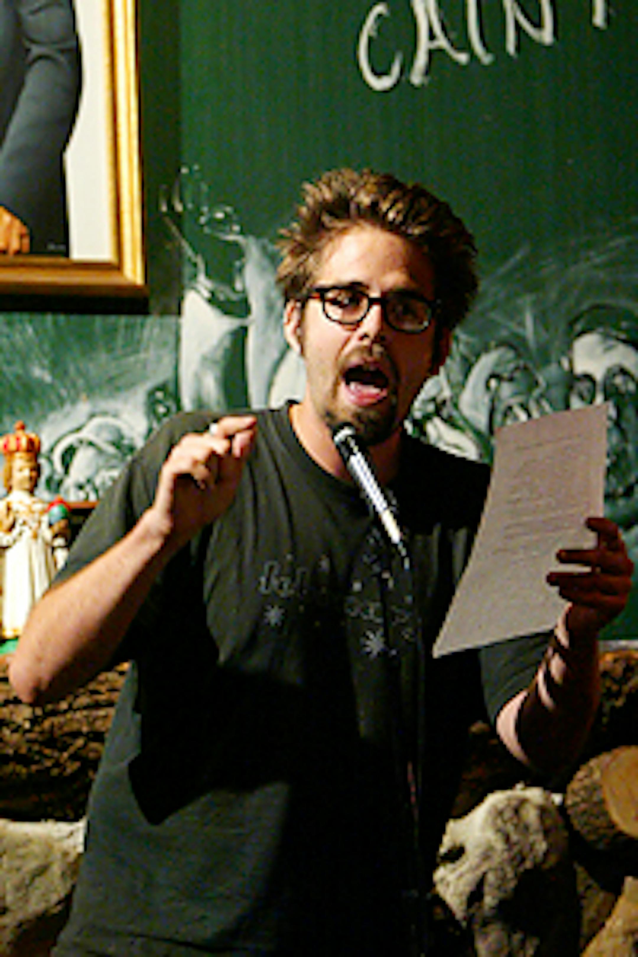 John Troyer of the Minnesota Slam Team. The National Poetry Slam was held in Minneapolis in 2002.