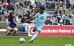 Minnesota United's Bongokuhle Hlongwane (21) kicked the ball in the second half against the Chicago Fire during an MLS game on Saturday, April 23, 202
