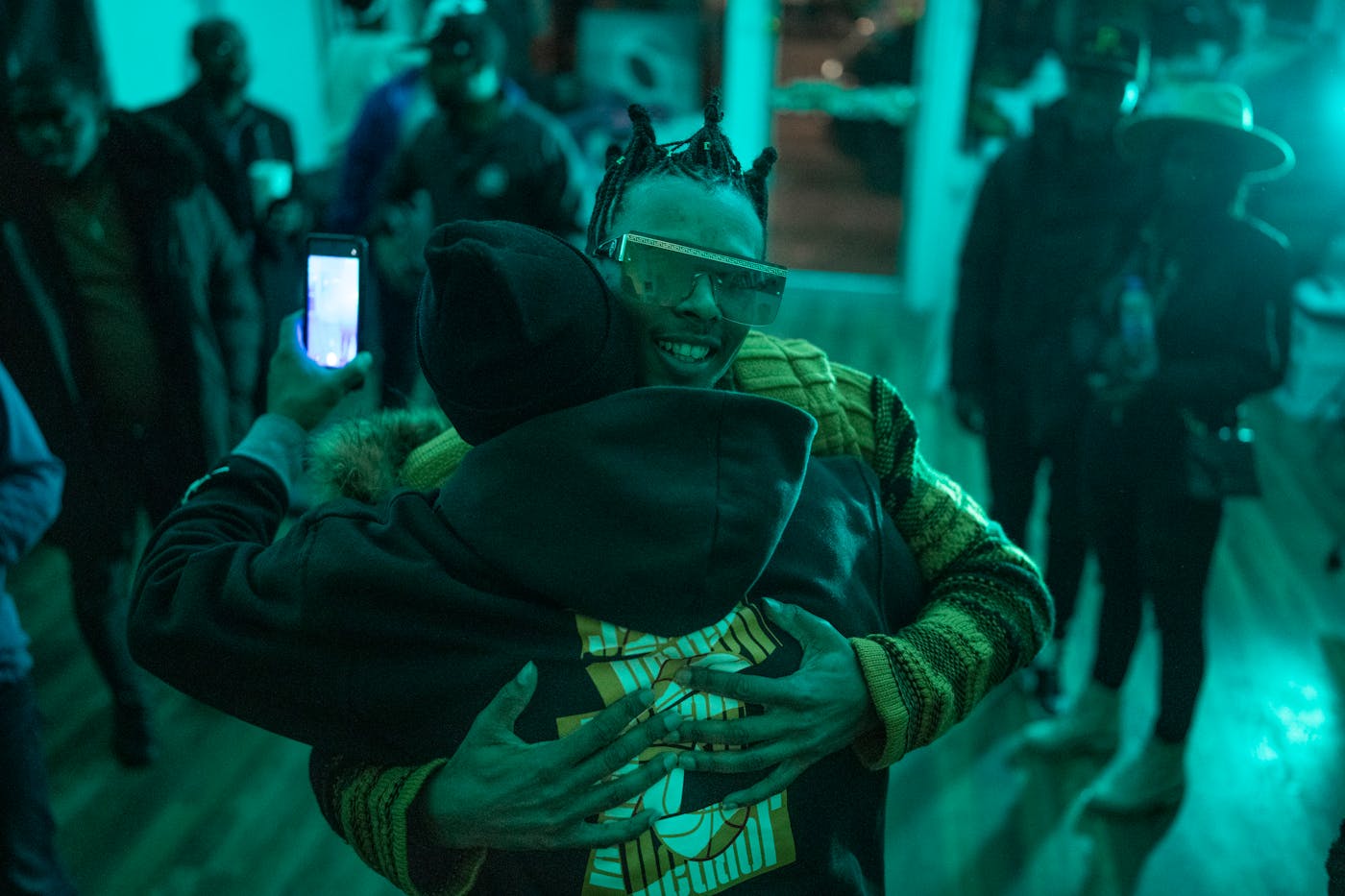 Musician Lewis McCaleb, known as Lewiee Blaze, celebrated his 25th birthday with friends. He considers himself "one of the lucky 50 percent" who survived extended probation without ending up in prison. He now mentors other teens in juvenile corrections.