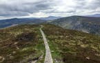 The Wicklow Way crosses the Wicklow Mountains near Lough Tay. The trail is the oldest marked trail in Ireland and stretches about 130 kilometers, or 8