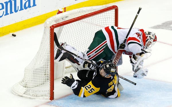 The Penguins’ Ryan Poehling, a former St. Cloud State center from Lakeville, collided with Devils goalie Vitek Vanecek during a Tuesday loss.