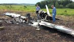 Courtesy Polk County Sheriff. Investigators with the Federal Aviation Administration with the aftermath of plane crash that killed four people near Am