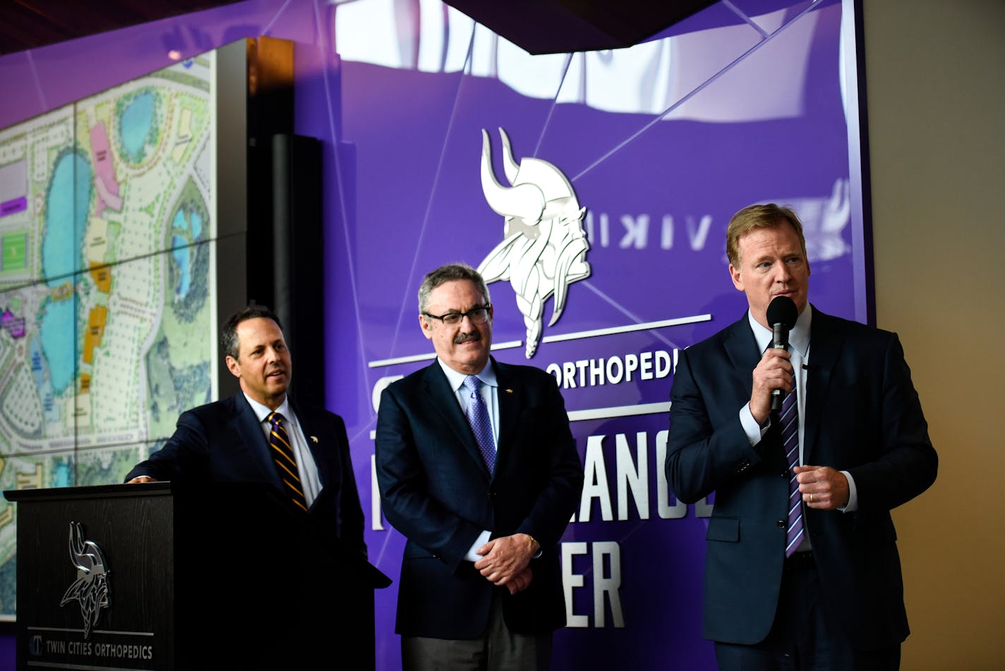 Vikings co-owner Mark Wilf (left) addressed NFL commissioner Roger Goodell's (right) new national anthem policy for the first time. Mark and Zygi Wilf, along with Goodell, participated in the unveiling ceremony of the Sid Hartman Interview Room on Friday.