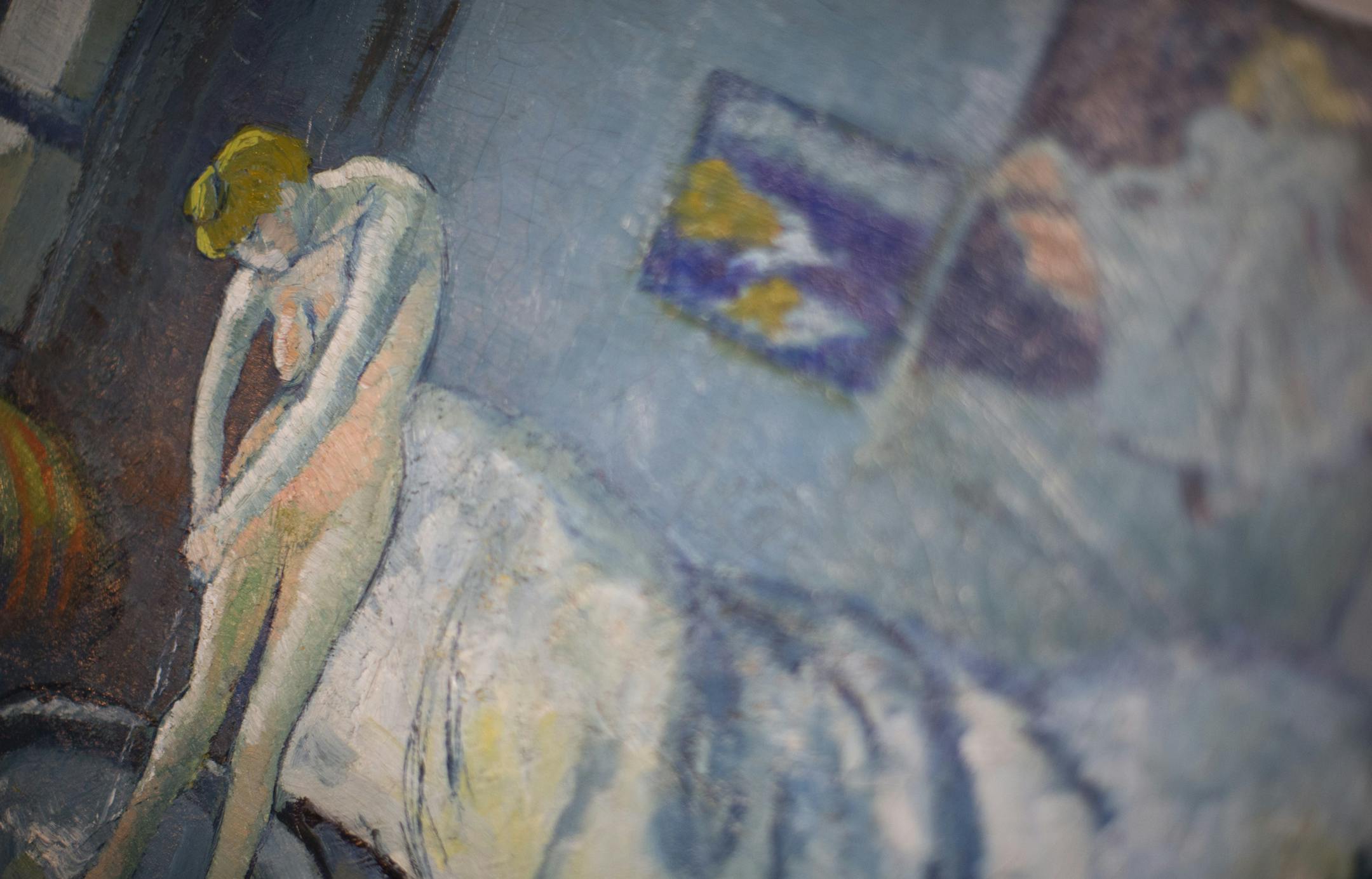 "The Blue Room," one of Pablo Picasso's first masterpieces at The Phillips Collection, on Tuesday, June 10, 2014, in Washington. Scientists and art experts have found a hidden painting beneath the painting. Advances in infrared imagery reveal a bow-tied man with his face resting on his hand, with three rings on his fingers. Now the question that conservators at The Phillips Collection in Washington hope to answer is simply: Who is he? It’s a mystery that’s fueling new research abou