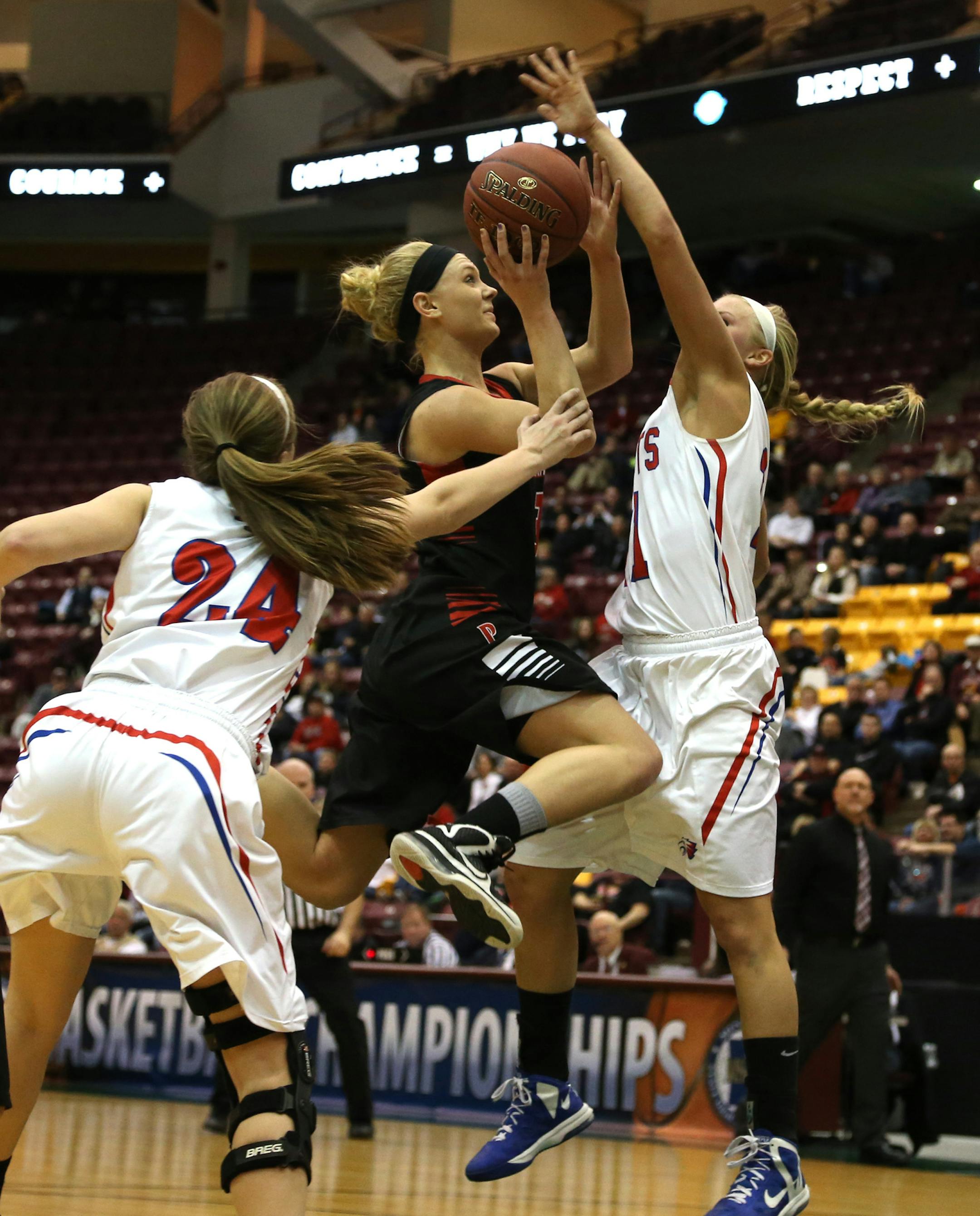 New Richland-HEG's Carlie Wagner went up for a layup with Pequot Lakes Vanessa Lane defending during the second half ] (KYNDELL HARKNESS/STAR TRIBUNE) kyndell.harkness@startribune.com During the 2A quarterfinals at Mariucci Arena in Minneapolis Min, Wednesday March 19, 2014 New Rchland-HEG won over Pequot Lakes 100-68.