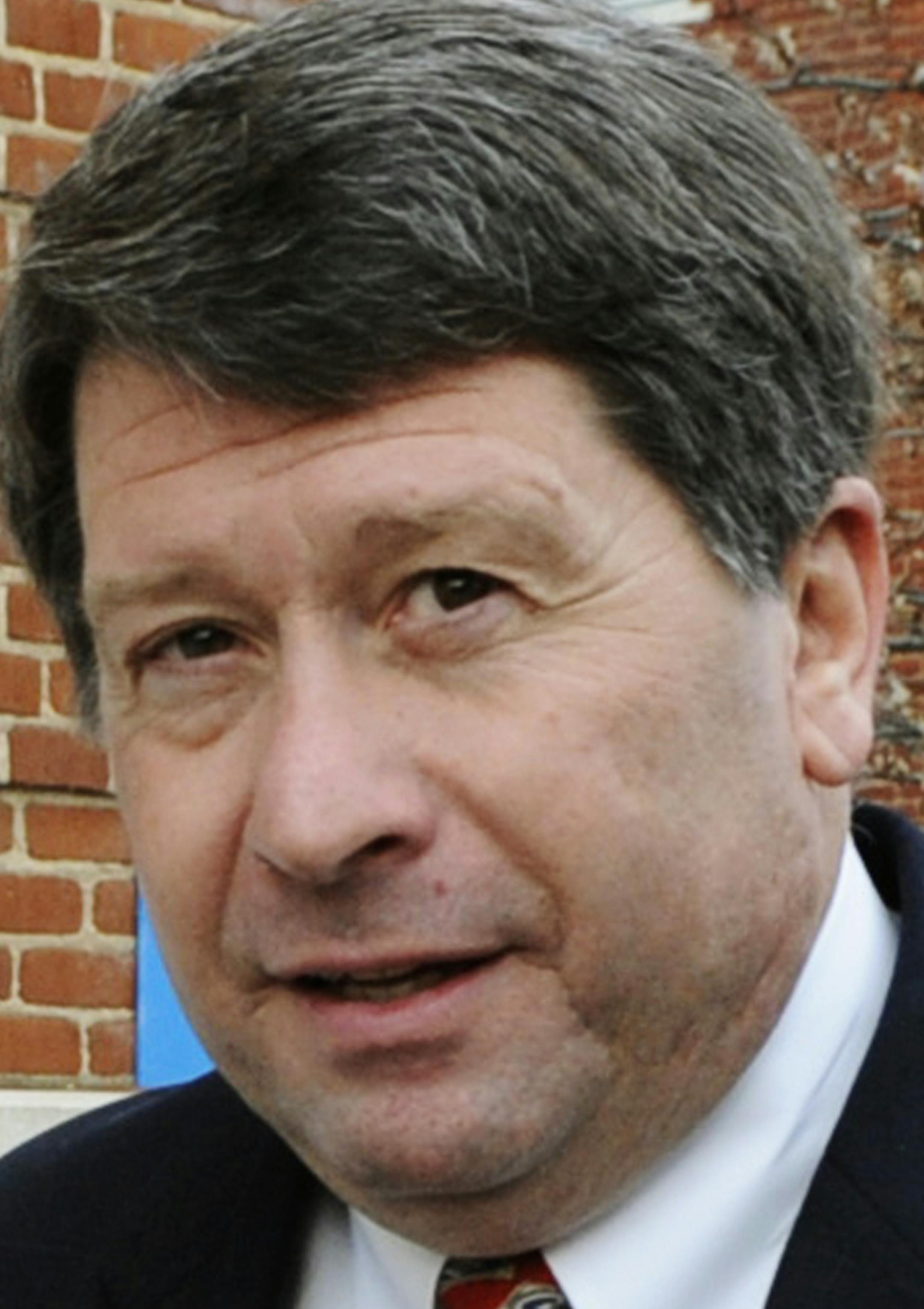 FILE - In this March 12, 2009, file photo, Peanut Corporation of America's president Stewart Parnell arrives a federal court in Lynchburg, Va. Parnell's family asked a federal judge in Albany, Ga., on Monday, Sept. 21, 2015, to show mercy when sentencing him for his role in a deadly salmonella outbreak from 2008 and 2009. Meanwhile, victims' families have asked the judge to deliver a stiff sentence. (AP Photo/Don Petersen, File)