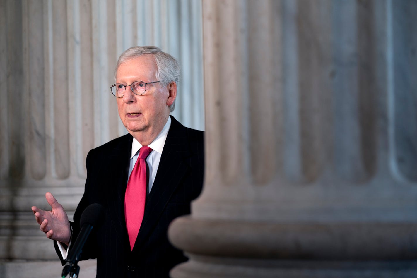 FILE — Senate Majority Leader Mitch McConnell (R-Ky.) gives an interview on Capitol Hill in Washington Dec. 21, 2020. McConnell has told associates he is pleased that Democrats are moving to impeach Trump, believing that it will make it easier to purge him from the party, according to people familiar with his thinking. (Stefani Reynolds/The New York Times)