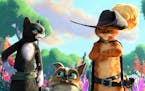“Puss in Boots: The Last Wish” stars, from left, Kitty Soft Paws (voiced by Salma Hayek), Perro (Harvey GuillÃcn) and Puss in Boots (Antonio Band
