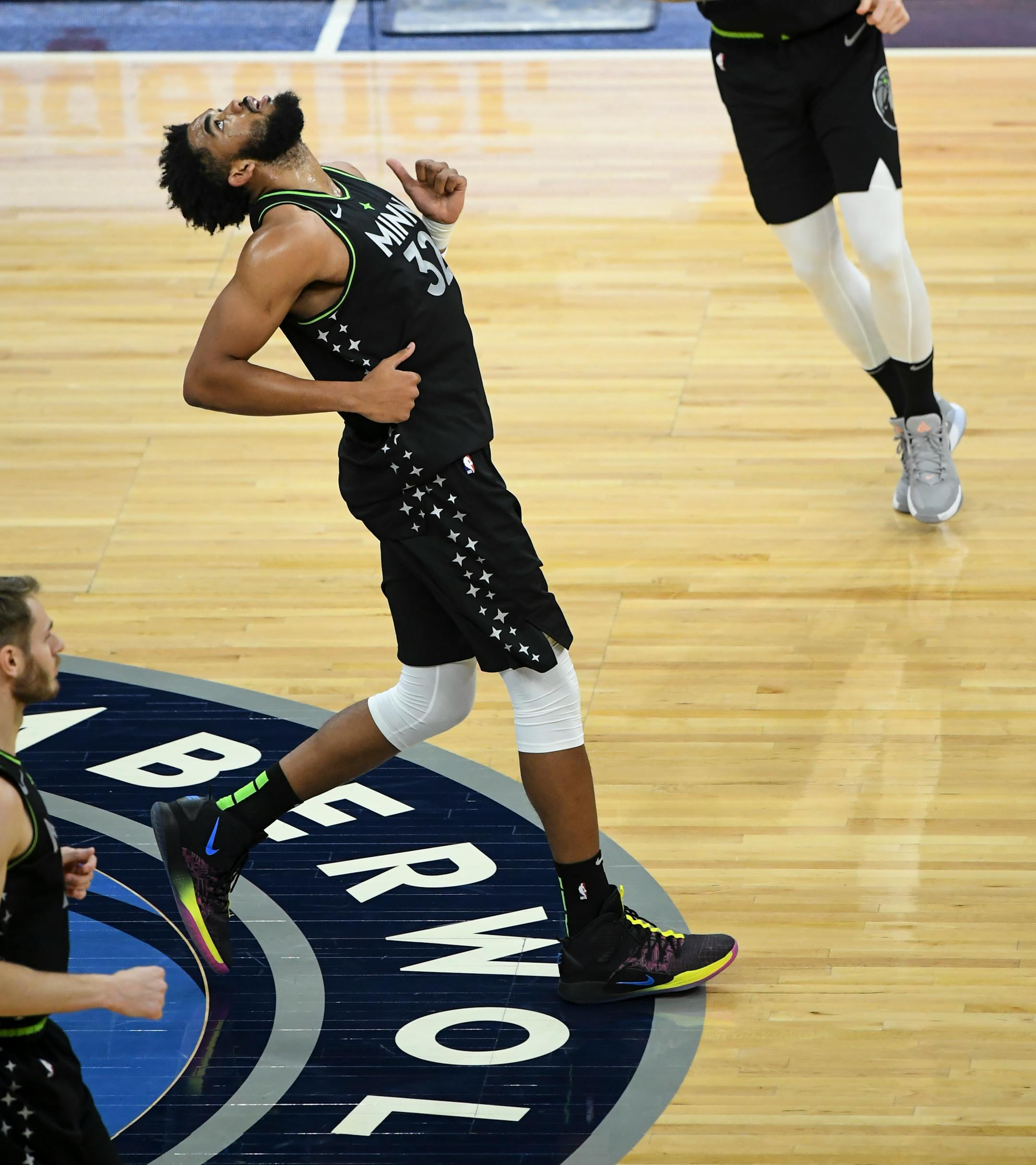 Minnesota Timberwolves center Karl-Anthony Towns (32) was frustrated after missing a shot in the first quarter against the Dallas Mavericks.