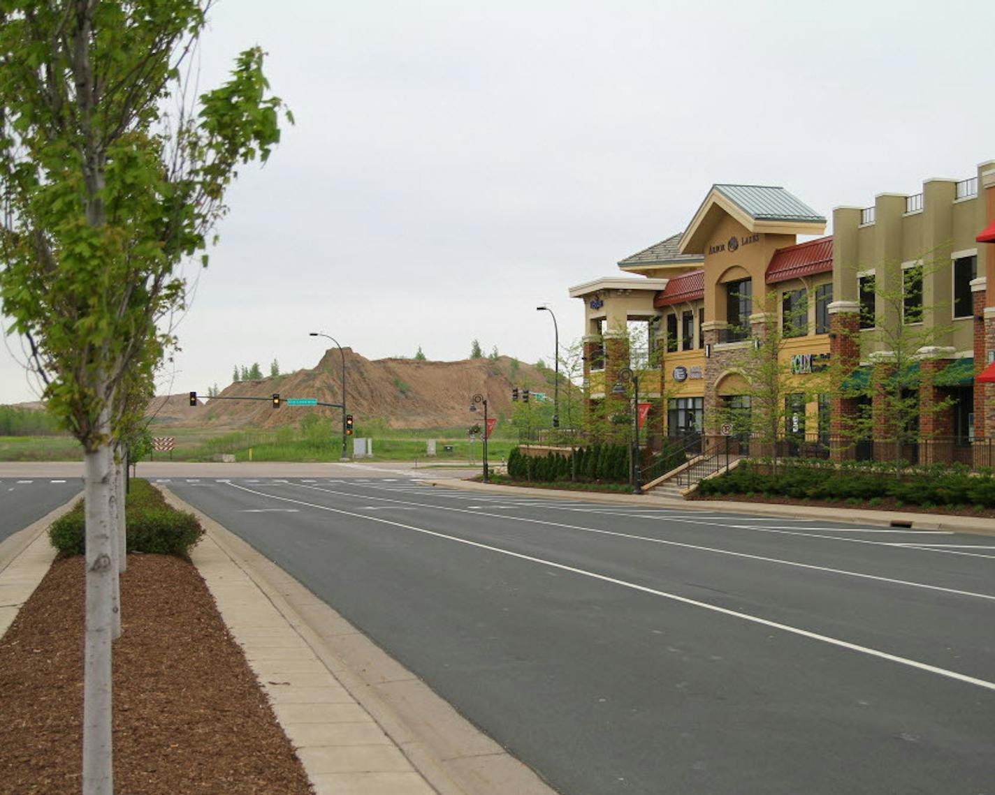 A sand and gravel pit sits just across from the Arbor Lakes shopping center, on land the city of Maple Grove would like to develop. File photo.