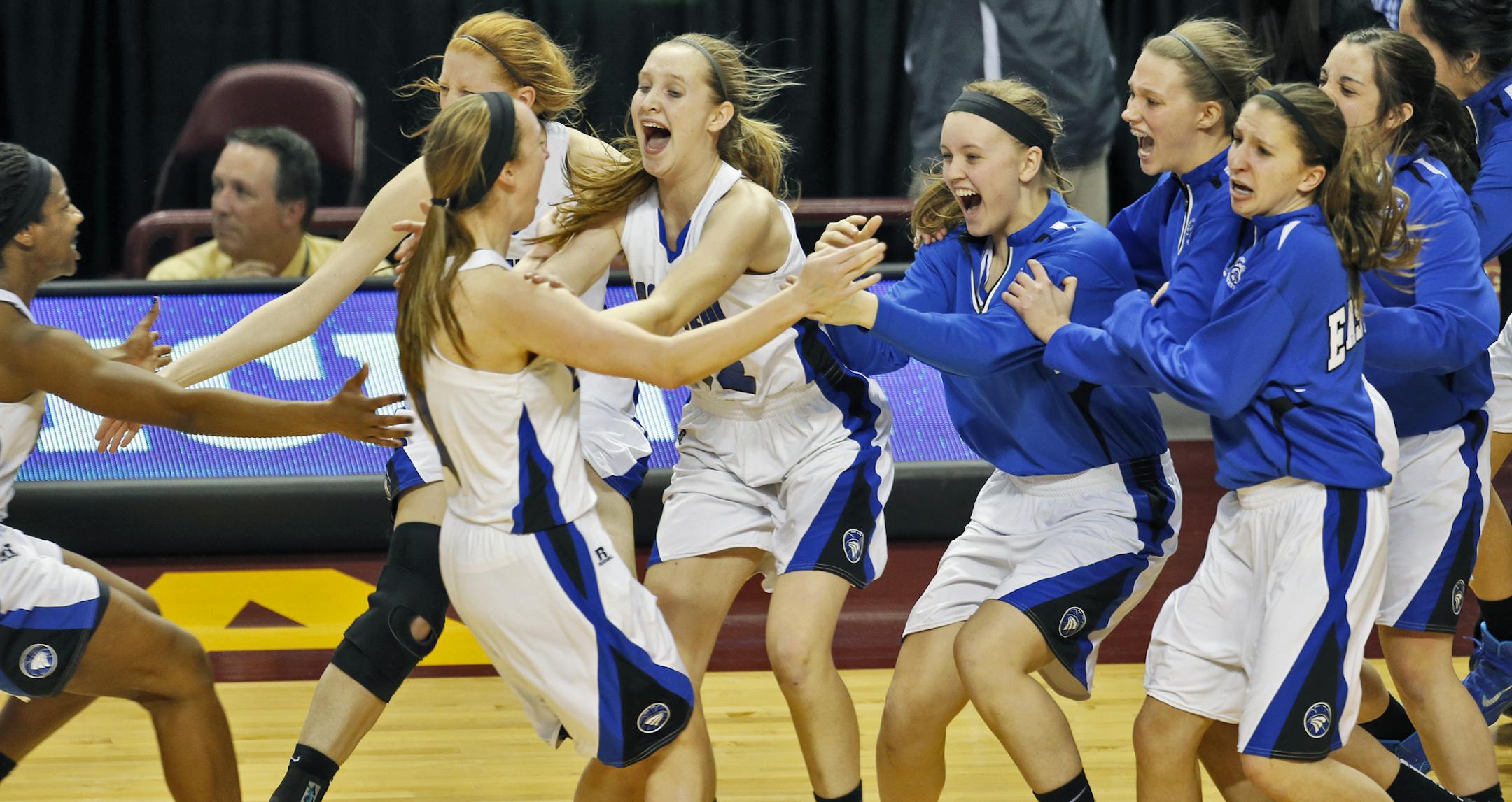 Eastview celebrates at the final horn. ] Girls Basketball Championship Game - Class 4A - Bloomington Kennedy Eagles vs. Eastview Lightning. Eastview won 64-61. (MARLIN LEVISON/STARTRIBUNE(mlevison@startribune.com)