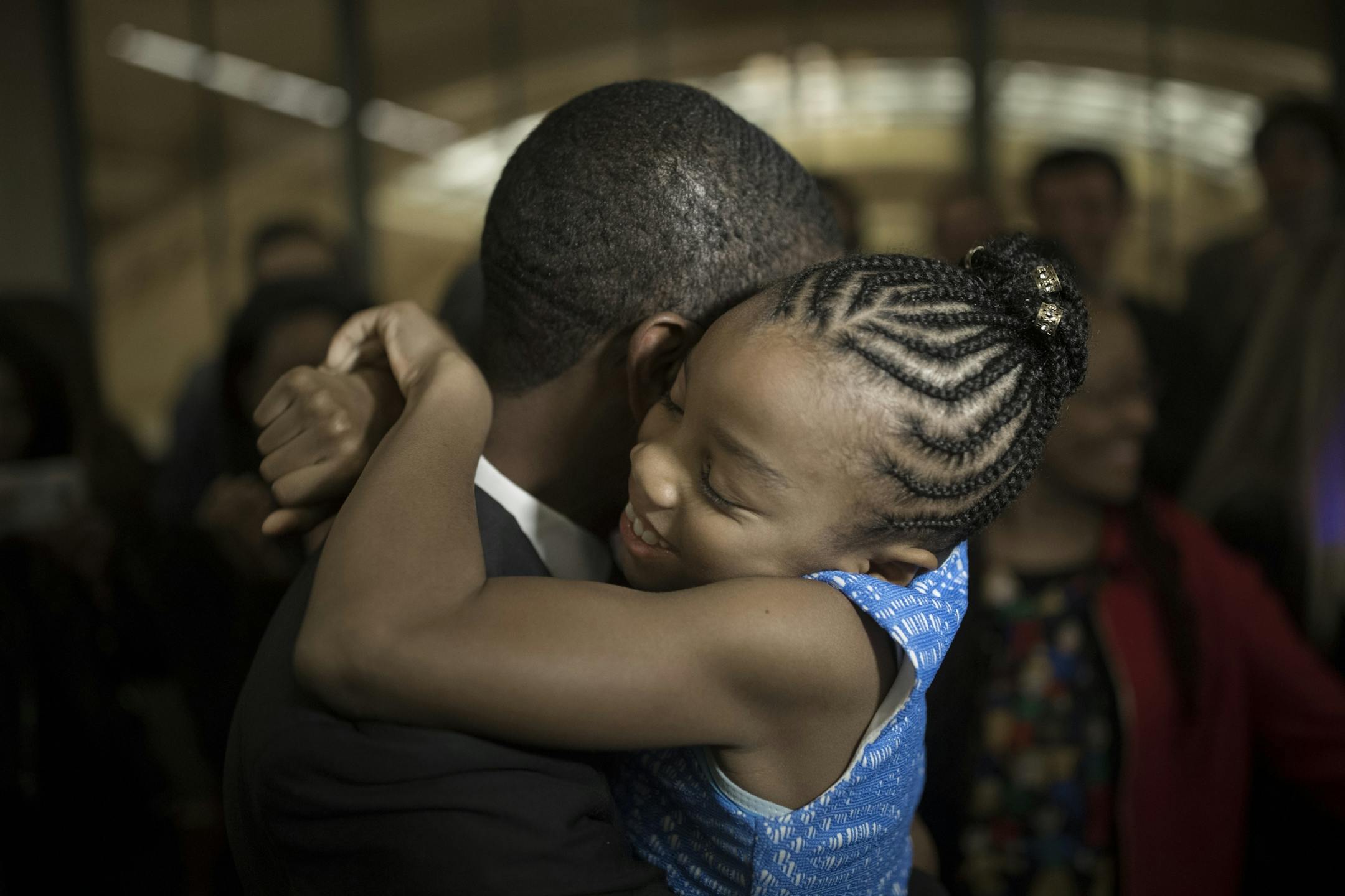 St. Paul mayoral candidate Melvin Carter hugged his daughter Naomi, 9 at the Union Depot Tuesday November 7,2017 in St. Paul, MN.