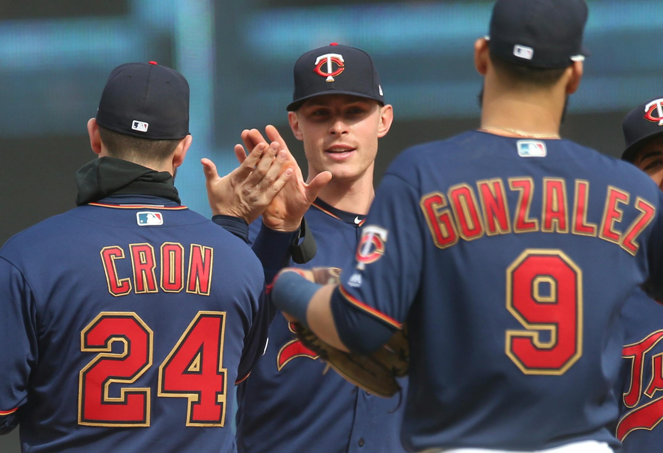 The Twins' Max Kepler celebrates Saturday's victory over Baltimore with teammates C.J. Cron and Marwin Gonzalez. All three homered in the game.
