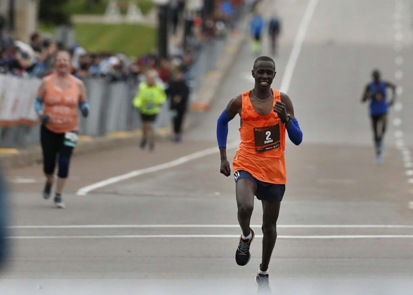 Elisha Barno (bib No. 2), from Kenya, won the Twin Cities Marathon with a time of 2:11:58.