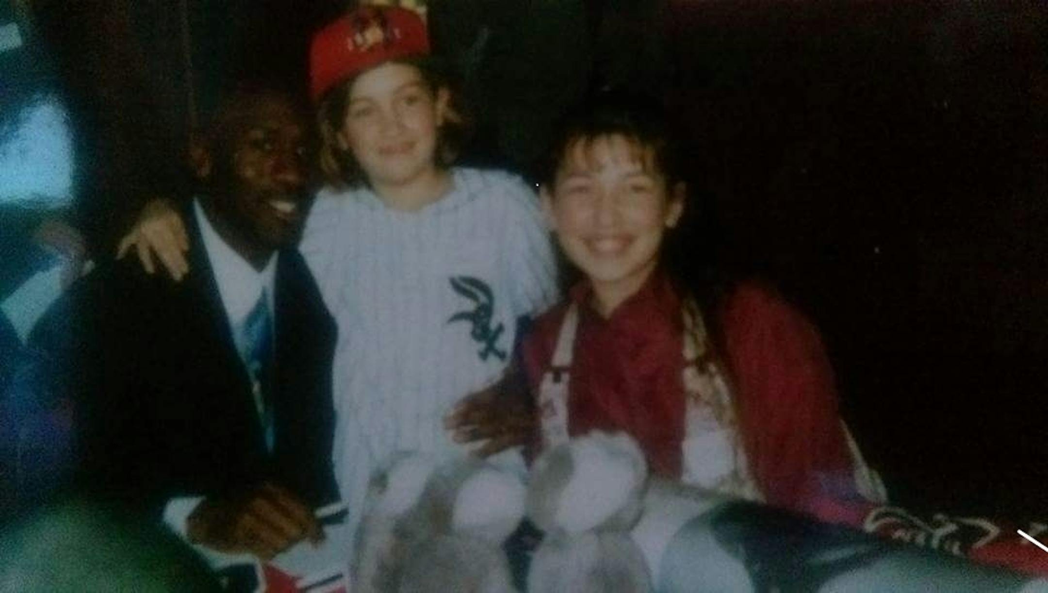 Kelsey Schiel, next to Michael Jordan at the signing of the jersey. Also with them was her sister, Brittany.