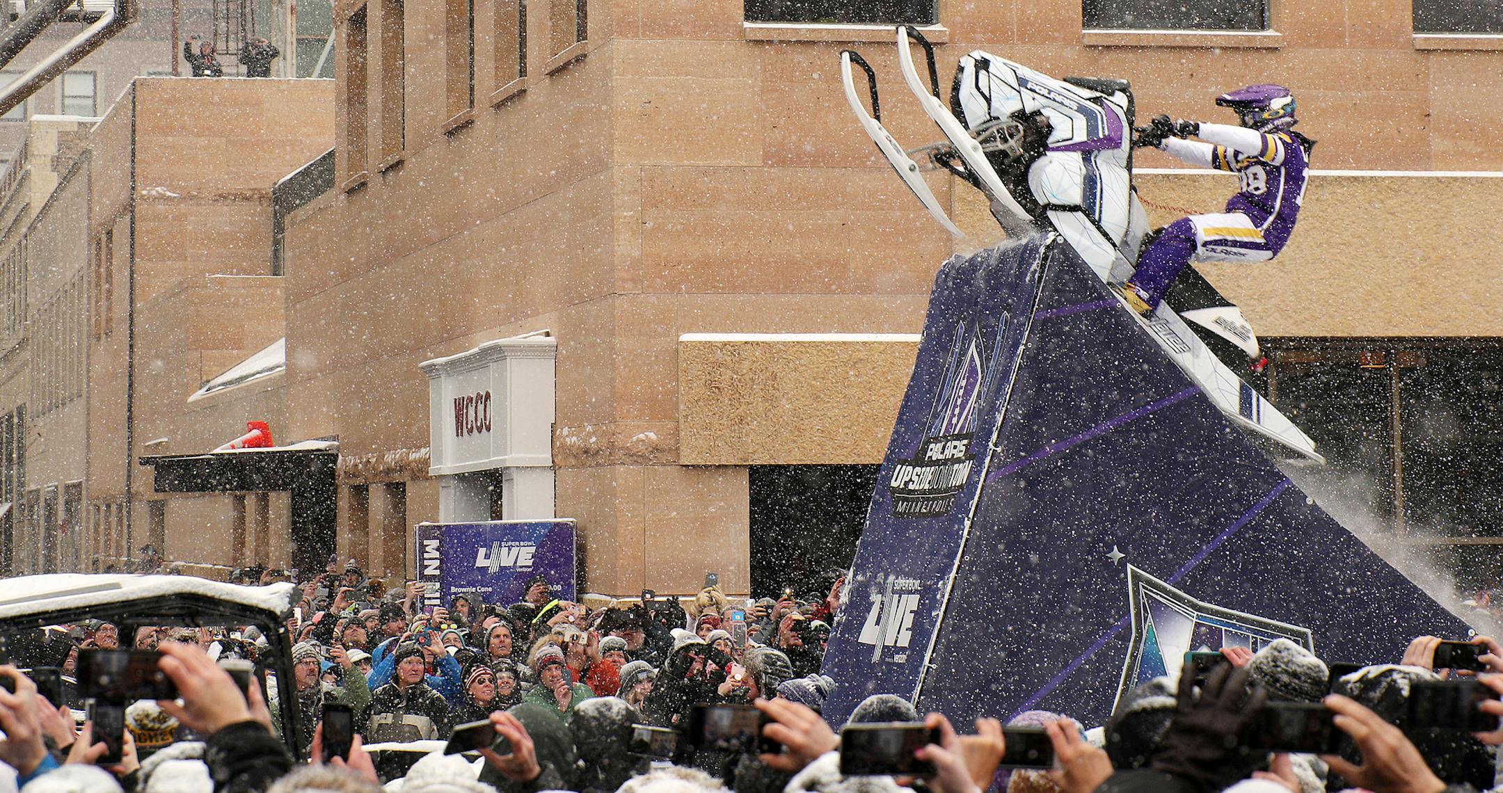 Levi LaValle leapt a snowmobile over Nicollet Mall for the Polaris UpsideDown stunt Saturday. ] ANTHONY SOUFFLE ï anthony.souffle@startribune.com Super Bowl Live attendees took part in Saturday's festivities including an Eagles and Patriots rally as well as the Polaris UpsideDown stunt where Levi LaValle leapt a snowmobile over Nicollet Mall Saturday, Feb. 3, in downtown Minneapolis.