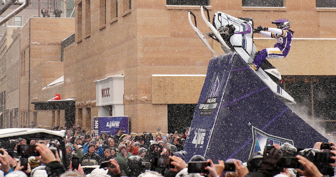 Levi LaValle leapt a snowmobile over Nicollet Mall for the Polaris UpsideDown stunt Saturday. ] ANTHONY SOUFFLE &#xef; anthony.souffle@startribune.com Super Bowl Live attendees took part in Saturday's festivities including an Eagles and Patriots rally as well as the Polaris UpsideDown stunt where Levi LaValle leapt a snowmobile over Nicollet Mall Saturday, Feb. 3, in downtown Minneapolis.