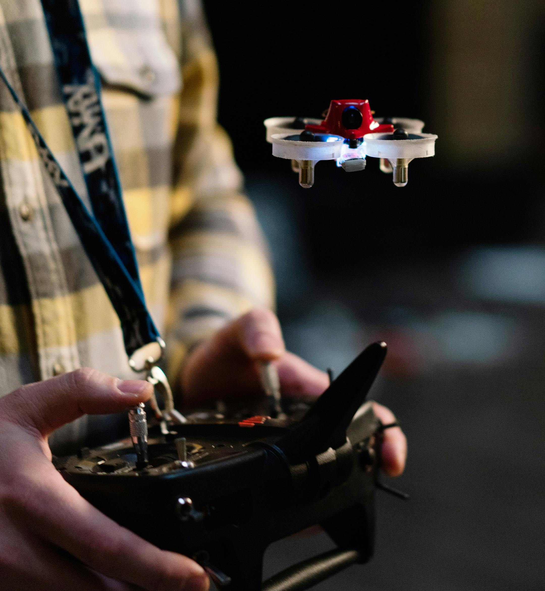 Tyler Mason poses for a portrait with a miniature Tiny Whoop drone. These small drones can send a live video feed back to goggles worn by the pilot and are popular for racing. ] MARK VANCLEAVE ï mark.vancleave@startribune.com * Tyler Mason is the director of digital media at AirVuz, a Minneapolis-based online drone video platform and production company. Photographed Tuesday, Nov. 20, 2018 outside the AirVuz headquarters in the Lumber Exchange building.