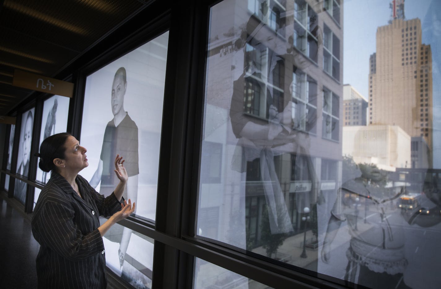 Artist Nancy Ann Coyne stands with her project "Speaking of Home" in the St. Paul skyway. ] LEILA NAVIDI &#xef; leila.navidi@startribune.com BACKGROUND INFORMATION: "Speaking of Home" a public art project installed in the St. Paul skyways by artist Nancy Ann Coyne seen on Thursday, August 31, 2017.