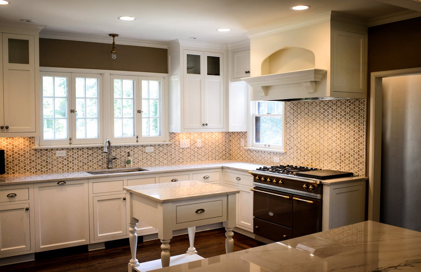 Kitchen ] Pillar Homes Builder K.C. Cermak gives a tour of whole house makeover of a 1927 Edina home, part of the first Midwest Home "Luxury Remodeling" tour. Tuesday, July 29, 2014. GLEN STUBBE * gstubbe@startribune.com