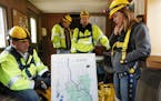 Katrina Kessler, director of Surface Water and Sewers for the Minneapolis Public Works Department, looked over a map of the city's storm sewers before