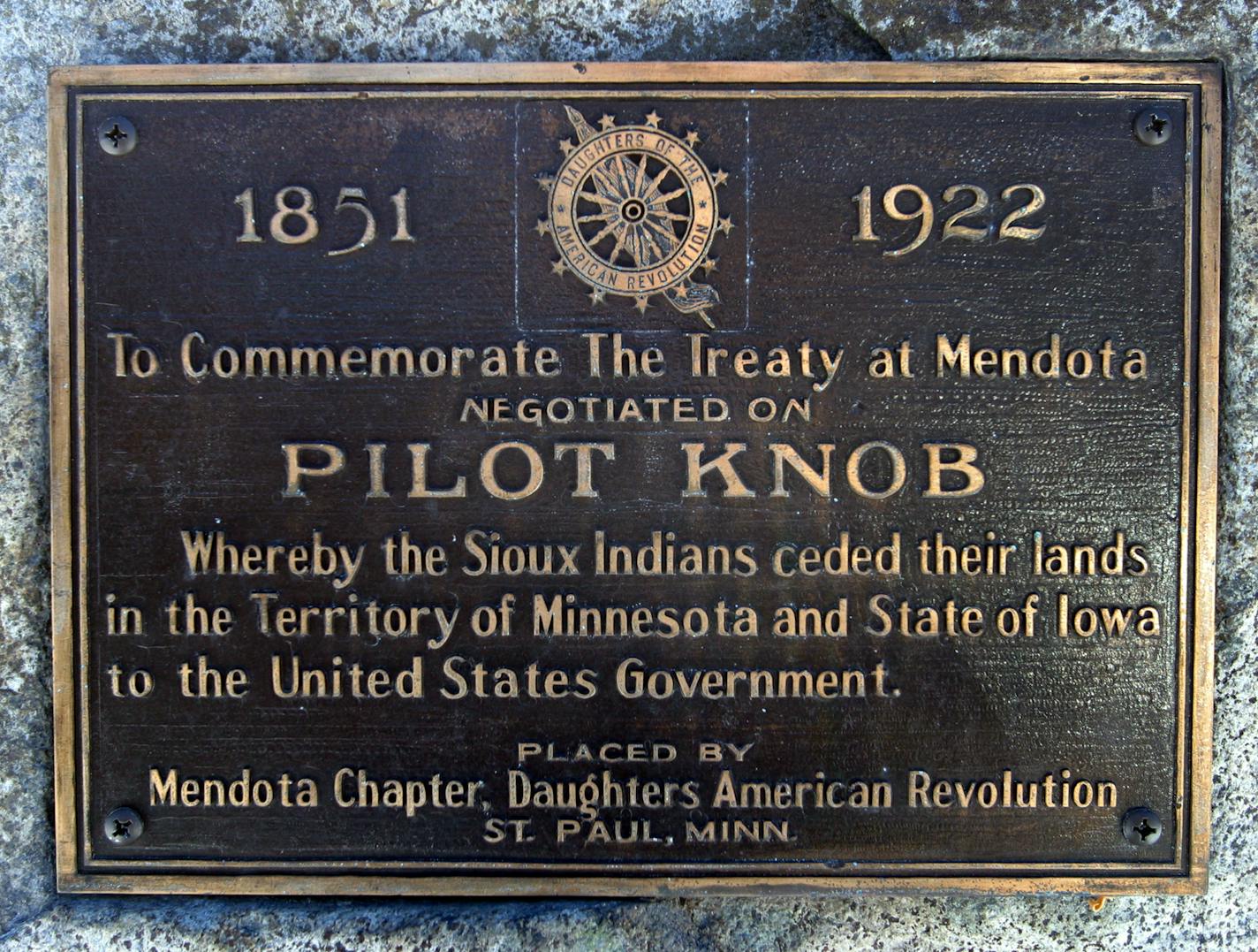 This plaque in the Acacia Cemetery indicates the site of the signing of the 1851 Treaty at Mendota. Brown claims that the whole area, including the cemetery was an indian burial ground and is sacred.
GENERAL INFORMATION: Mendota Heights, Mn., Mon., Feb. 17, 2003--Native Americans are objecting to the construction of condos on a piece of land on the south end of the Mendota Bridge, The bluff, known as Pilot Knob, including Acacia Cemetery, is sacred ground, according to them.