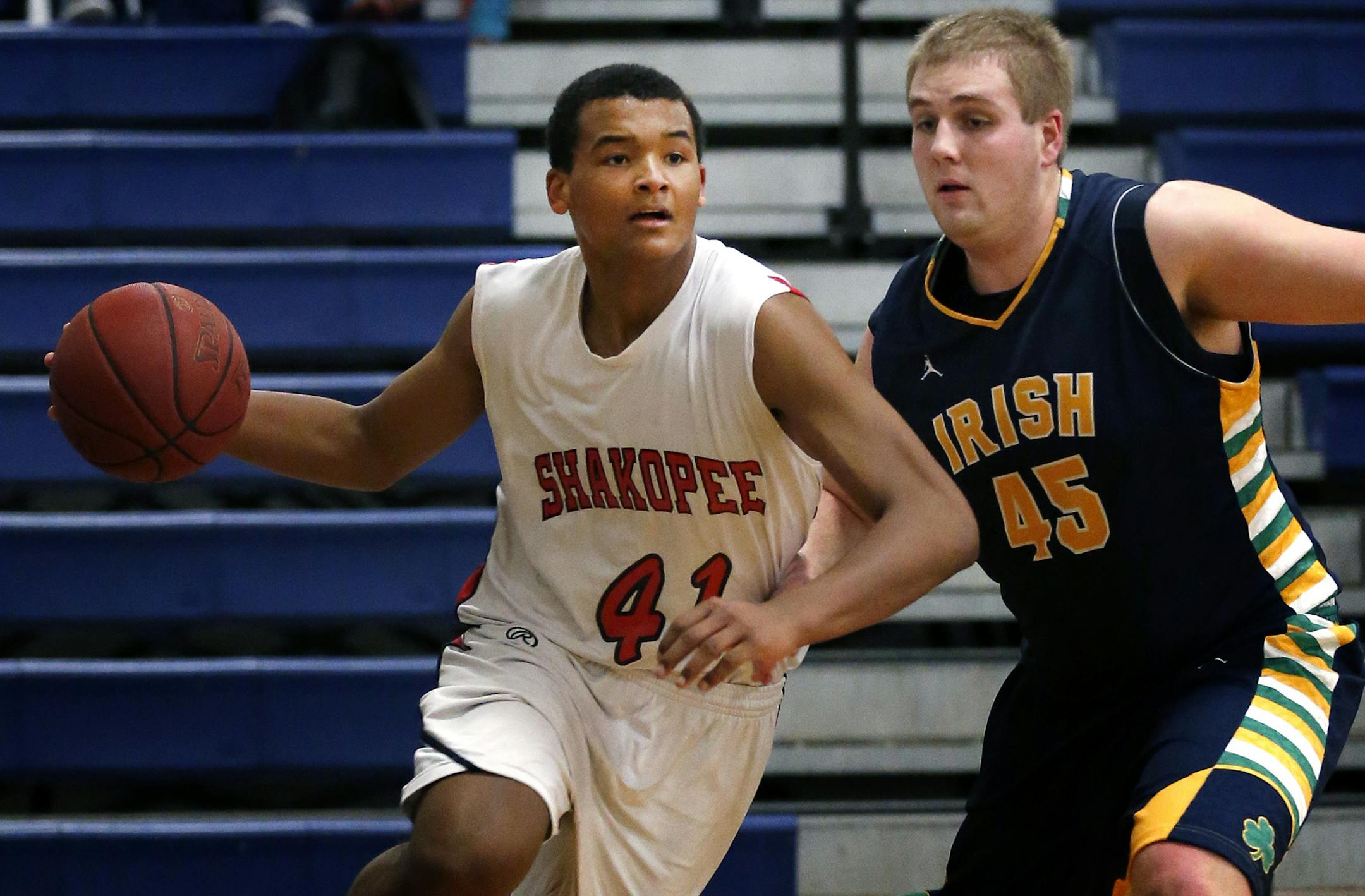 Steffon Mitchell, defended by Rosemount&#x2019;s Kyle Kaupa, is averaging 25.4 points per game. But even he&#x2019;s missed playing time because of a sprained ankle. (Carlos Gonzalez, Star Tribune)