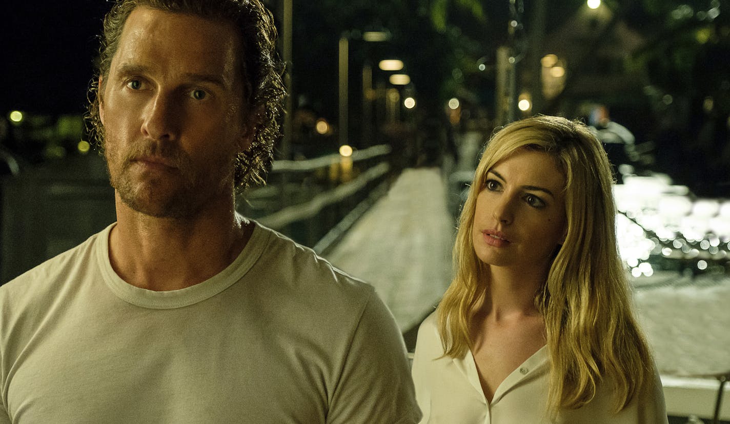 This image released by Aviron Pictures shows Matthew McConaughey, left, and Anne Hathaway in a scene from "Serenity." (Graham Bartholomew/Aviron Pictures via AP)