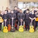 Members of Southwest High School’s adapted guitar program are raising funds to perform at a national convention in Florida in November.