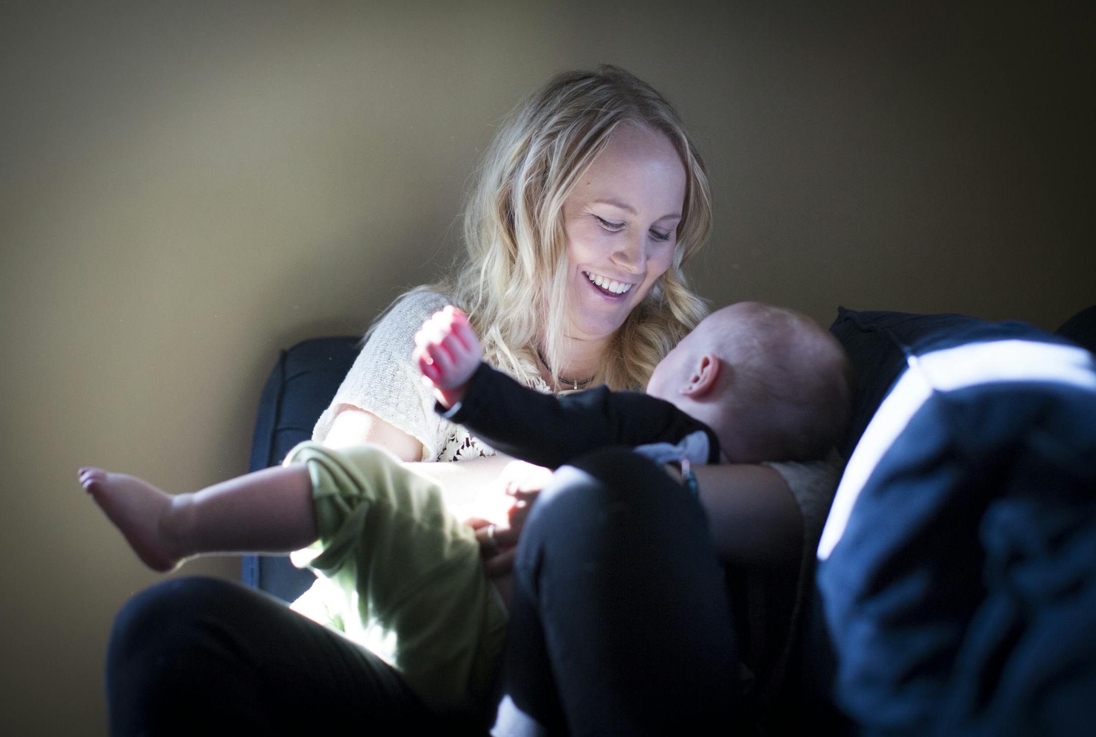 Ariel Landsberger held her son Sonney as she attempted to breastfeed him at their home in Minneapolis, Minn., on Tuesday, November 4, 2014. The young Minneapolis mom started a social media campaign on Instagram to normalize breastfeeding in public a few months ago. ] RENEE JONES SCHNEIDER • reneejones@startribune.com