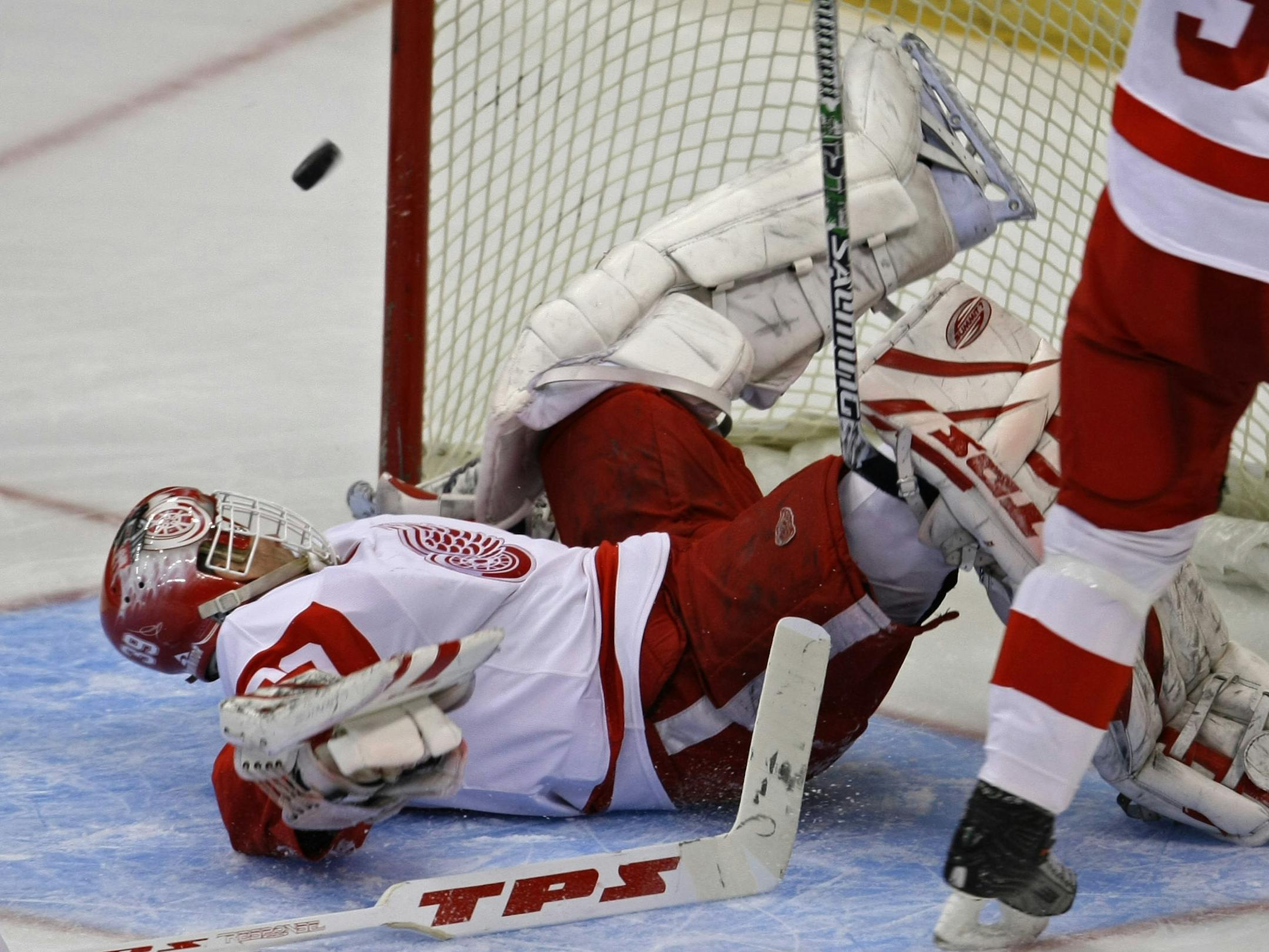 Goalie Dominik Hasek kept Detroit in the game until the Red Wings found a way to win in overtime Tuesday night. Hasek is now unbeaten in 12 games (10-0-2) against the Wild.