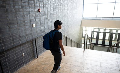 Mahi Madhan Kumar, 16, walks through his school on Tuesday in Chanhassen. Kumar is an Indian immigrant teen who has spent most of his life in the U.S.