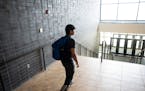 Mahi Madhan Kumar, 16, walks through his school on Tuesday in Chanhassen. Kumar is an Indian immigrant teen who has spent most of his life in the U.S.