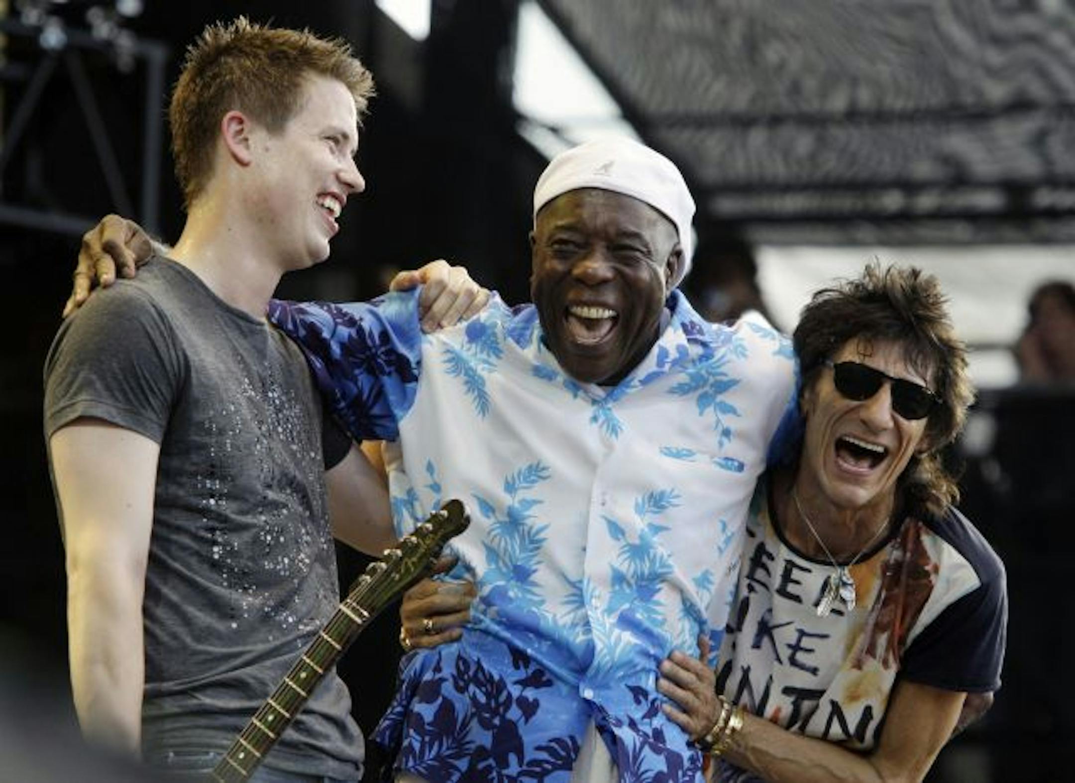 Jonny Lang, left, Buddy Guy, center, and Ronnie Wood.