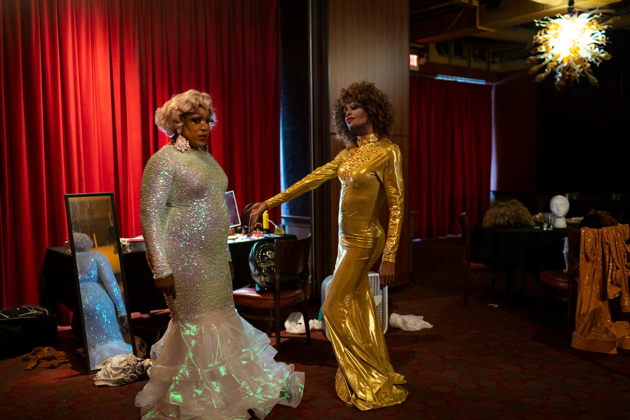 Sasha Cassadine and Cee Cee Russell hand out backstage before performing at a weekly drag show hosted by Flip Phone Events At Crave on Sunday, June 20, 2021, in Minneapolis. ] ANTRANIK TAVITIAN • anto.tavitian@startribune.com