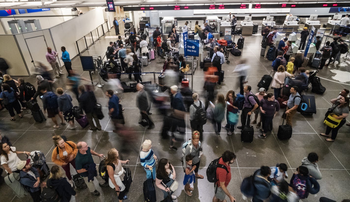 Lines were long right early Monday morning regardless of whether people were headed to the North or South checkpoint.] Everybody without PreCheck goes through one checkpoint at MSP Airport's main terminal starting Monday. That'll make for a crowd at the North checkpoint in the morning, which is a particularly busy time at the airport. The crunch comes because the south checkpoint will be under construction and limited to people with Precheck status. RICHARD TSONG-TAATARII &#xa5; richard.tsong-ta