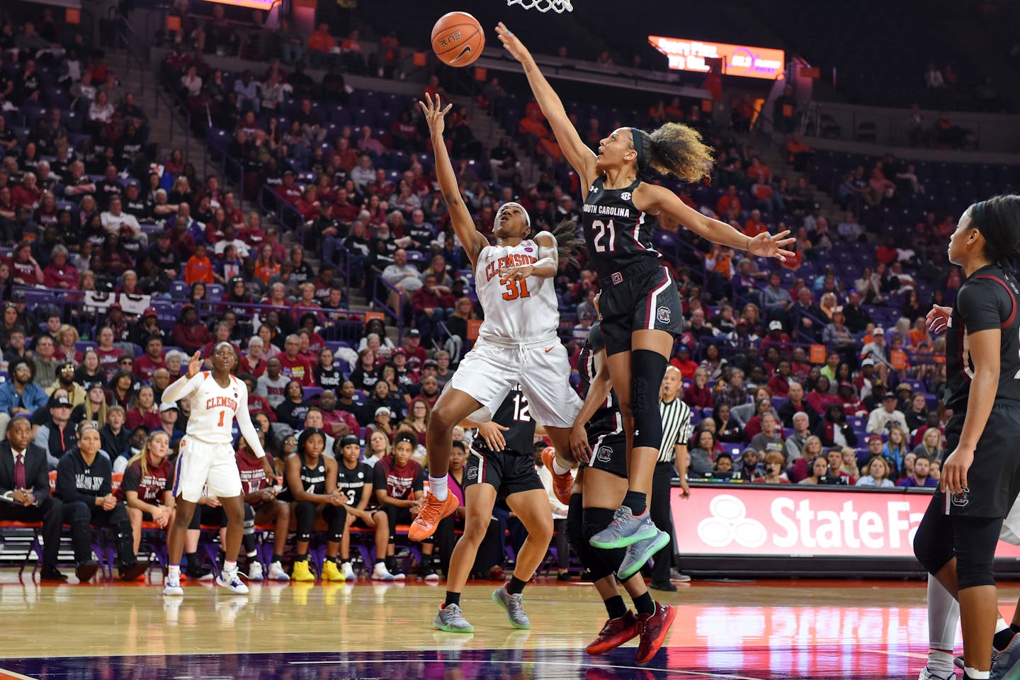 South Carolina's Mikiah Herbert Harrigan blocked a shot by Clemson's Shania Meertens last fall. The Lynx's top draft choice had 58 blocks last season for the Gamecocks.